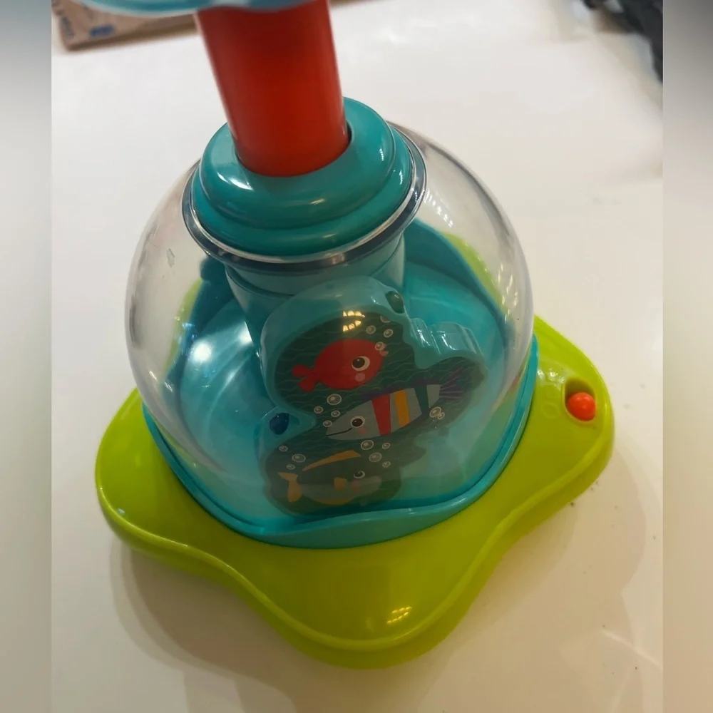 BRIGHT STARS PRESS AND GLOW SPINNER.  EVERY PUSH MAKES THE STARS GLOW